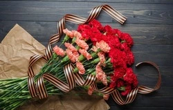 Михаил Лобазнов и Галина Колесникова поздравили губкинцев с Днём защитника Отечества 