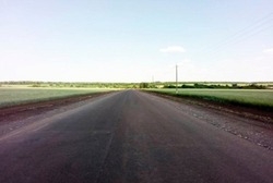 Ремонт подъездной дороги к хутору Калинин продолжился в Губкинском горокруге 